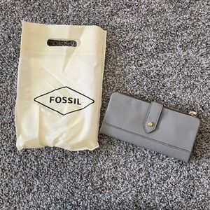 New with tags Fossil gray wallet.